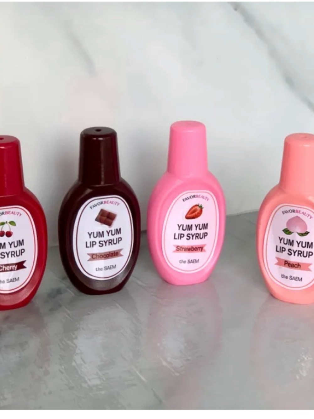 the SAEM Yum Yum Lip Syrup - Strawberry Pink